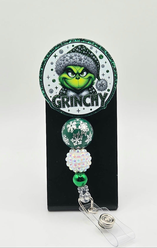 “Grinchy” Sassy Christmas Badge Reel – Acrylic & Rhinestone Beads | 360° Swivel Clip