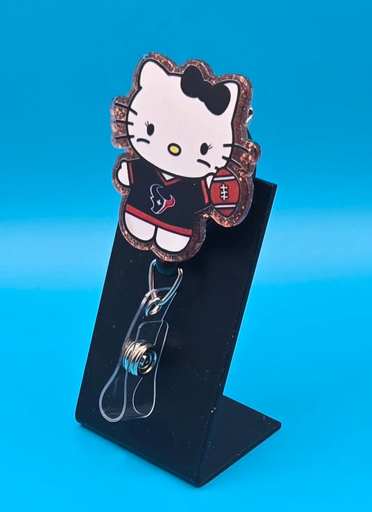 Sports Themed Cat Holding Football Acrylic Badge Reel