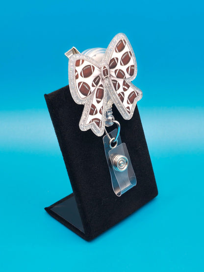 Sports Themed Bow with Footballs Acrylic Badge Reel