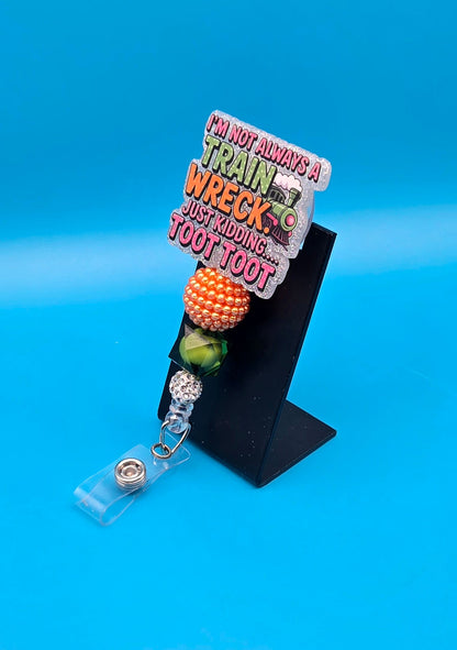 Toot Toot Acrylic Badge Reel