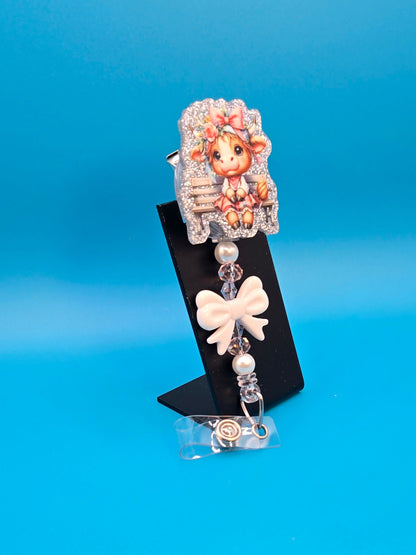 Cow with a Bow Acrylic Badge Reel