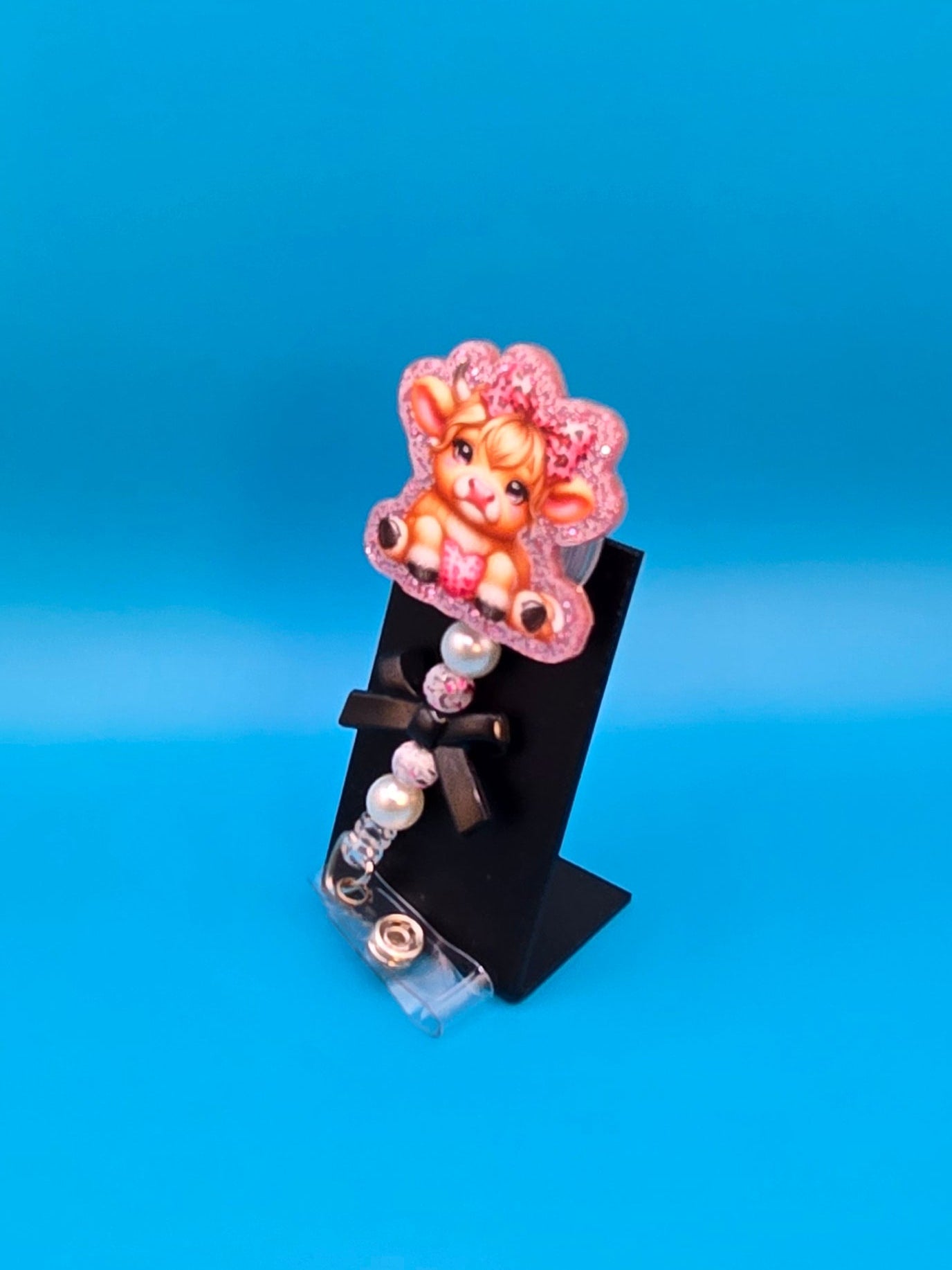 Pink Cow with a Bow Acrylic Badge Reel