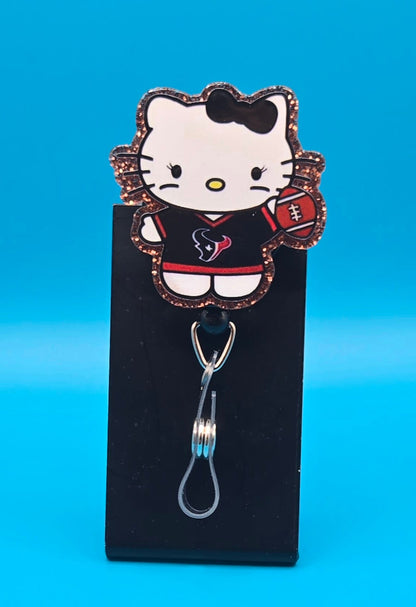 Sports Themed Cat Holding Football Acrylic Badge Reel