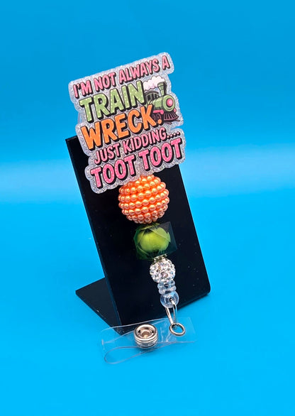 Toot Toot Acrylic Badge Reel
